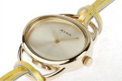NEU: Damen-Armbanduhr, oval, Metall mit Lederarmband; Farbe: Gold